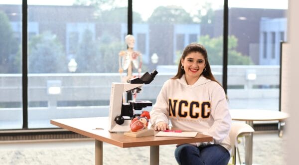 Student studying in Academic Center for Excellence