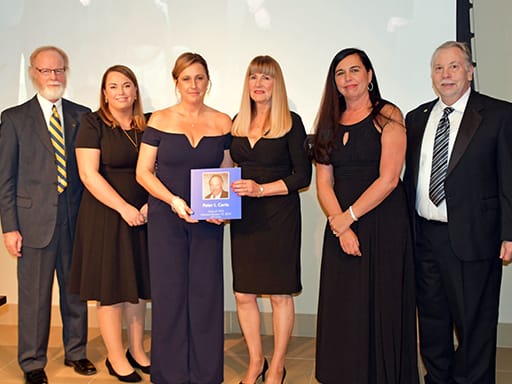 Certo family accepting award