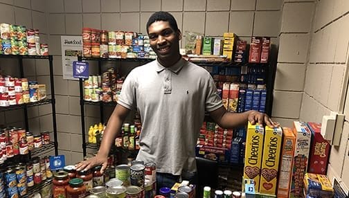 SUNY Niagara Student Maurice Jackson with the SUNY Niagara Campus Pantry