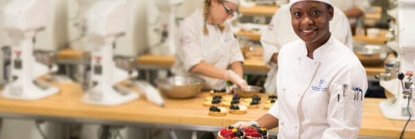 Baking and Pastry student displaying their pastries