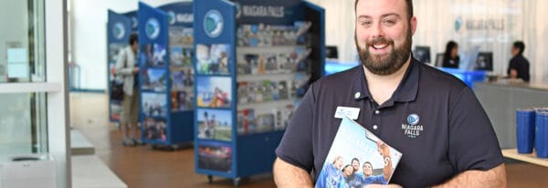 Hospitality worker in a Niagara Falls welcome center