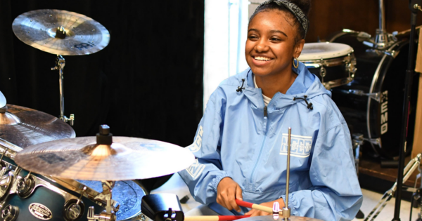 Student playing drums