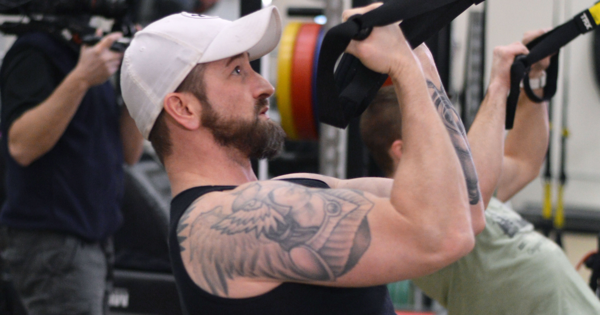 Person working out with gym equipment