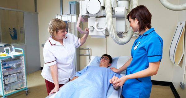 Student and instructor working in radiology lab