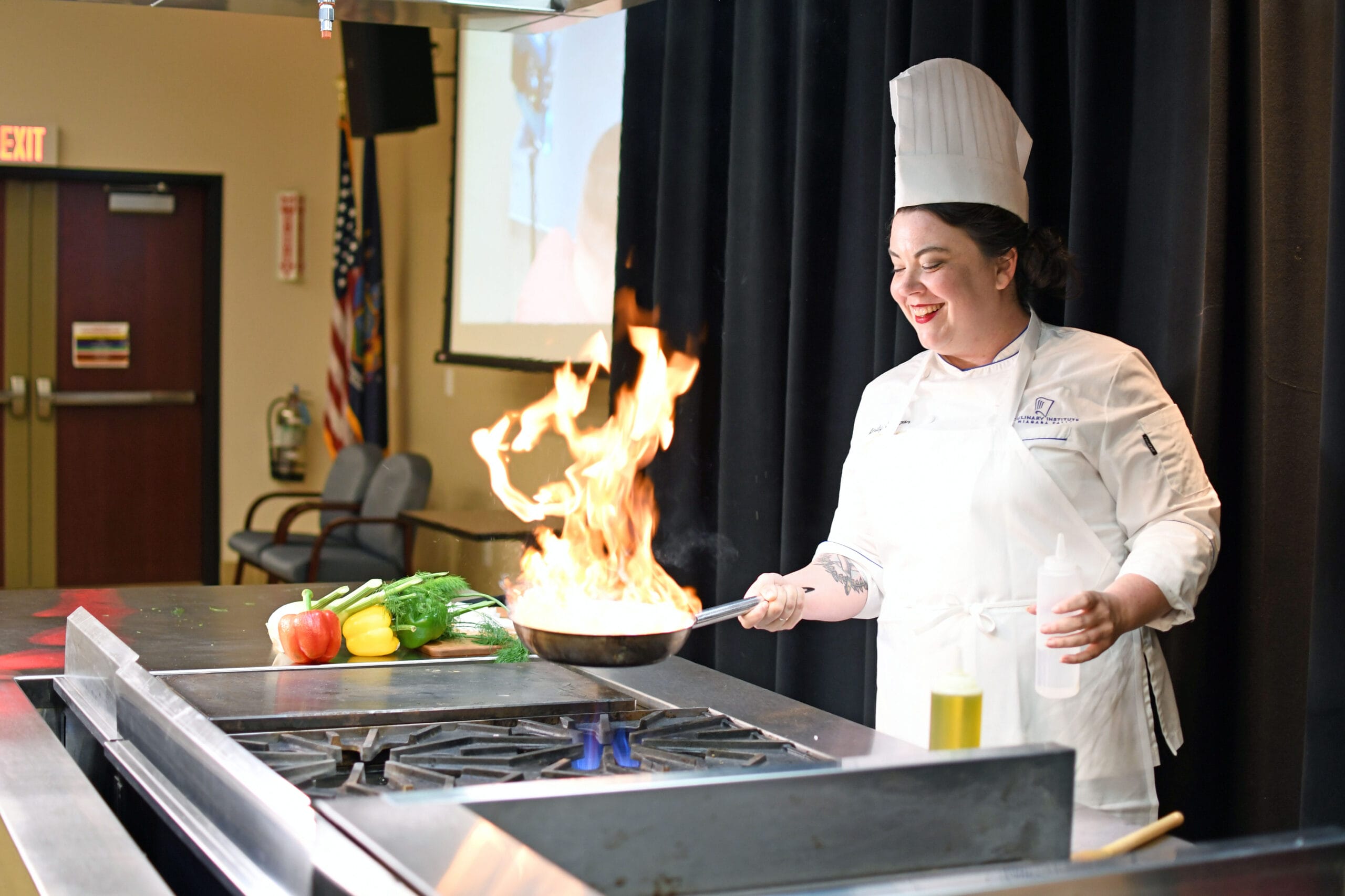 Chef at stove cooking