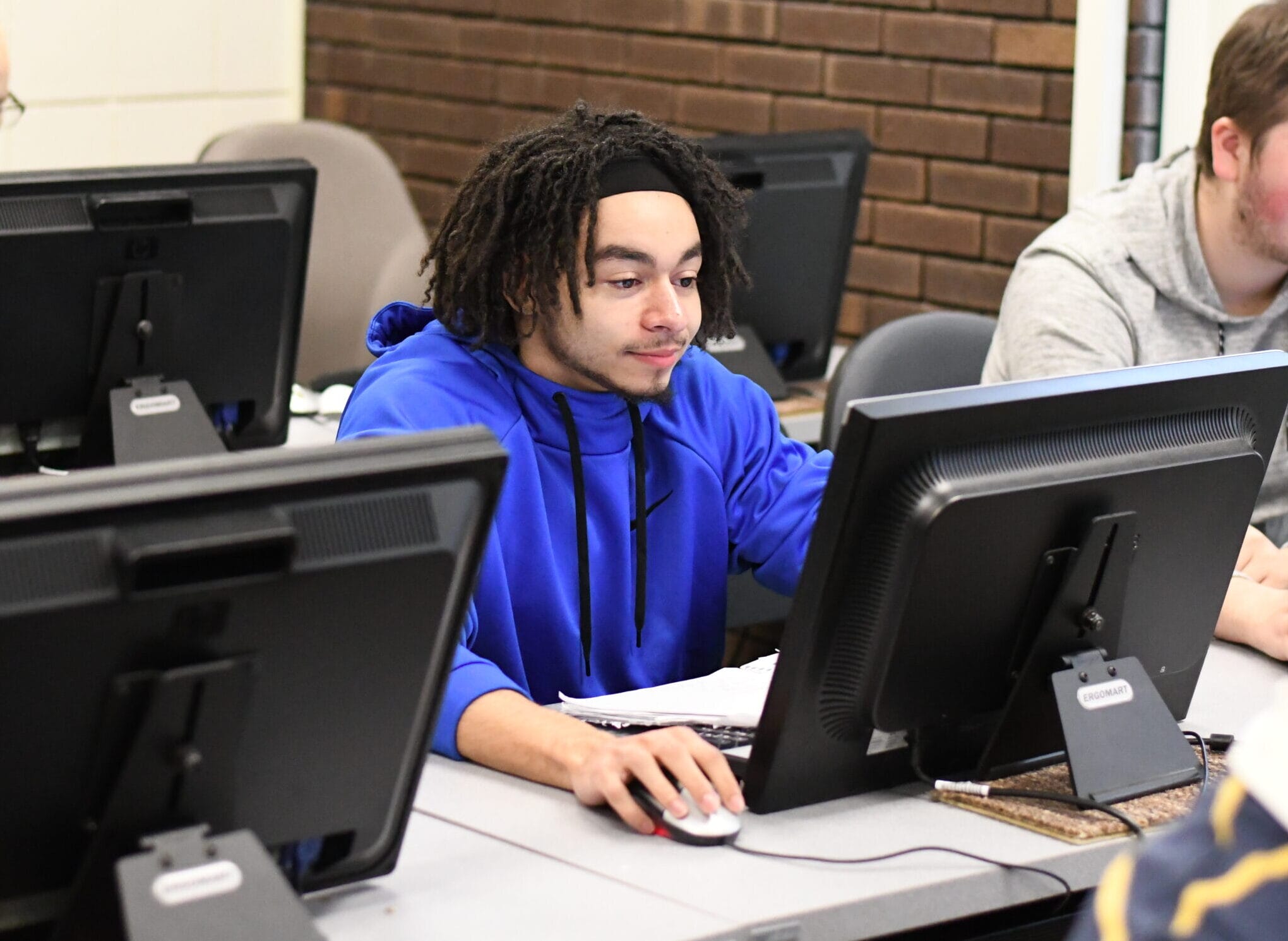 Student on computer in classroom