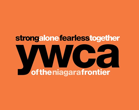 An orange background with bold black and white text reading: ‘strong alone fearless together’ (the words ‘alone’ and ‘together’ in white, the rest in black) above the logo ‘YWCA of the Niagara Frontier’ (‘YWCA’ in large black letters, ‘of the niagara frontier’ in smaller white letters