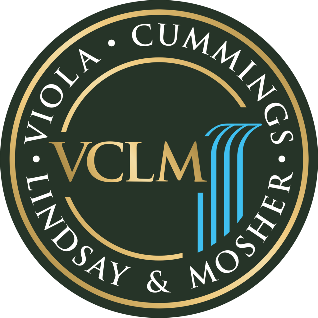 Circular logo with a dark background, gold border, and text: VIOLA • CUMMINGS • LINDSAY & MOSHER. Center has VCLM in gold with four blue lines curving upward on the right.